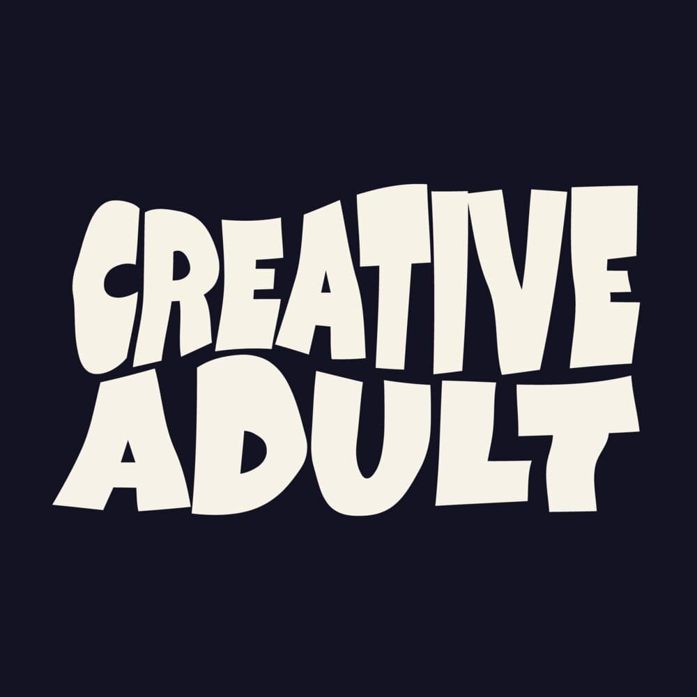 Creative Adult wordmark in cream on near-black
