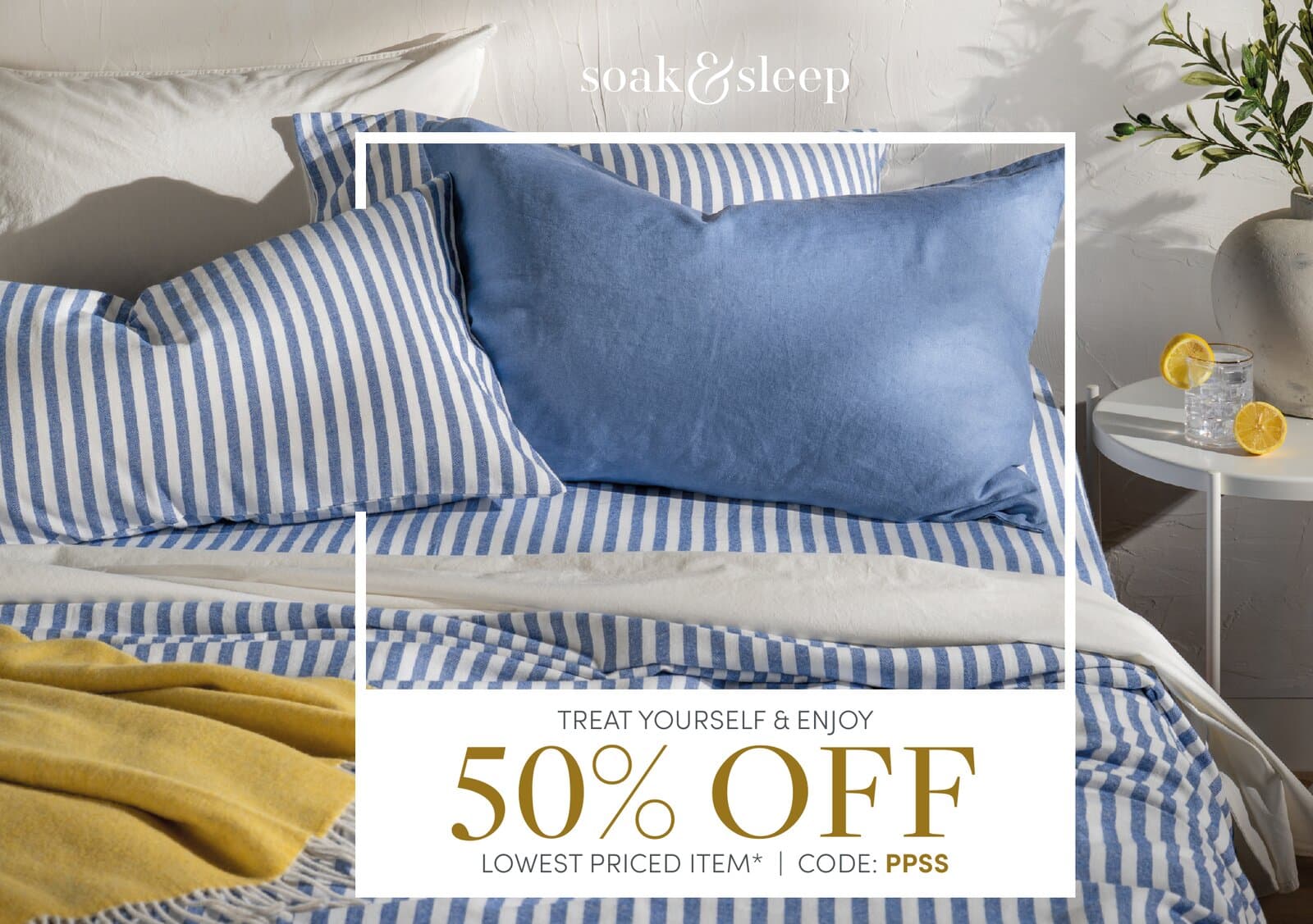 Sea & Citrus bounceback card, front: blue striped bedding with a 50% off lowest priced item offer